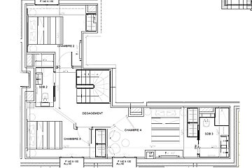 A black and white floor plan of a house with a staircase