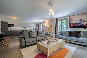 A living room with a couch and a coffee table