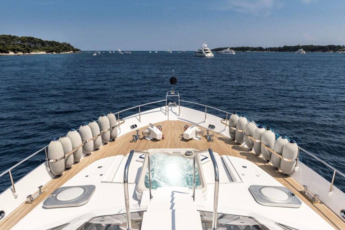 The front of a yacht with a hot tub on the deck