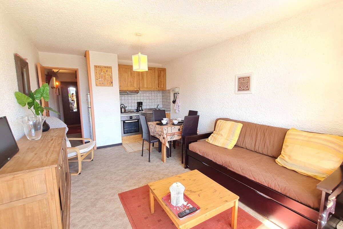 A living room with a couch and a coffee table