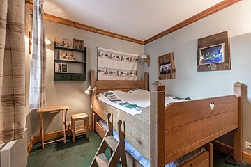 A kitchen with wooden cabinets and a bosch dishwasher