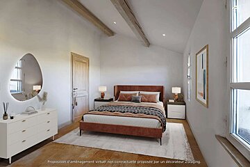 A bedroom with a large bed and a large mirror