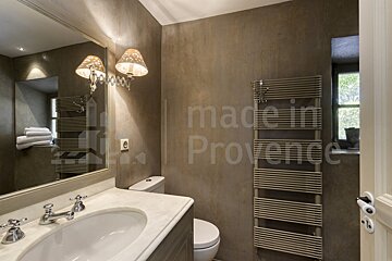 A bathroom with the words made in provence on the wall