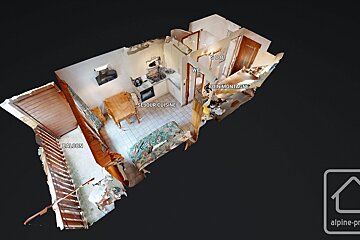 An aerial view of a house with balcony and sdb