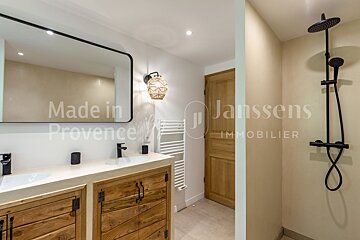 A bathroom with the words made in provence on the wall