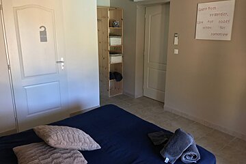A bedroom with a sign on the wall that says learn from yesterday live for today hope for tomorrow
