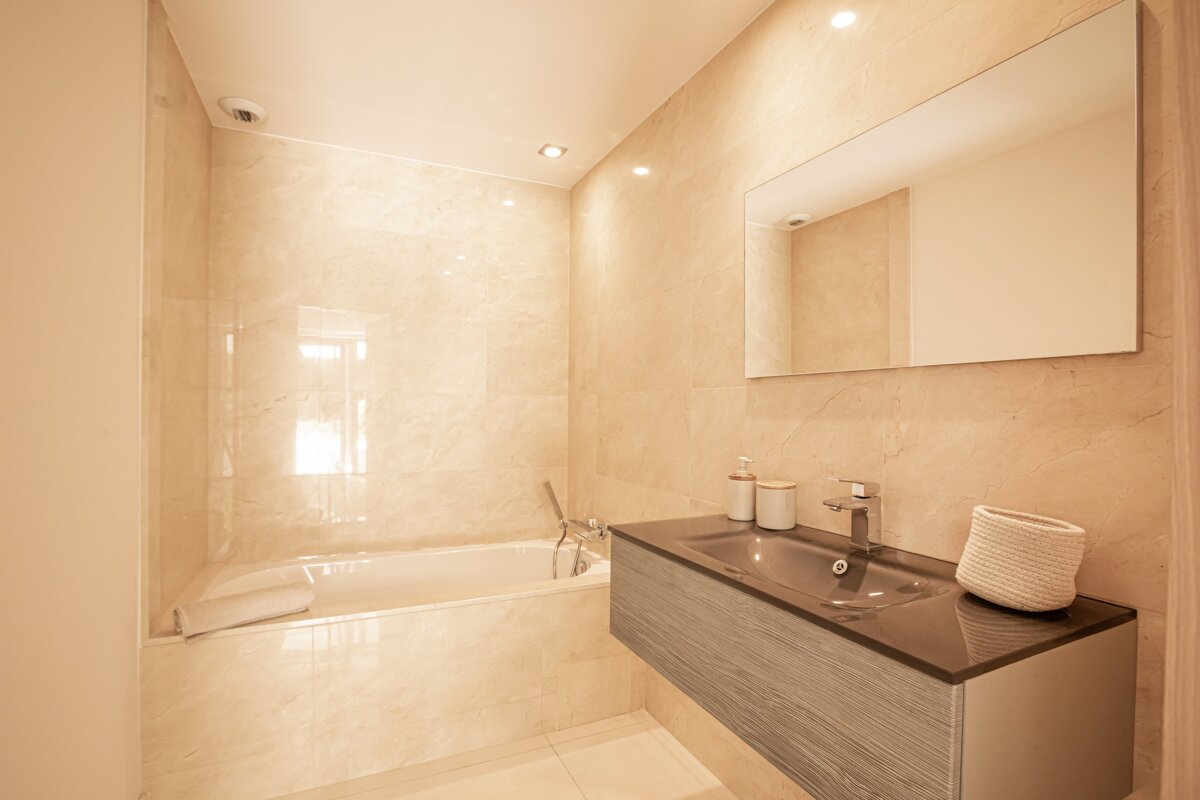 A bathroom with a sink and a bathtub