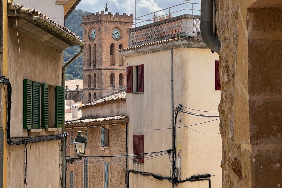 A building with a clock on the top of it