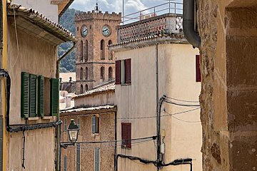A building with a clock on the top of it
