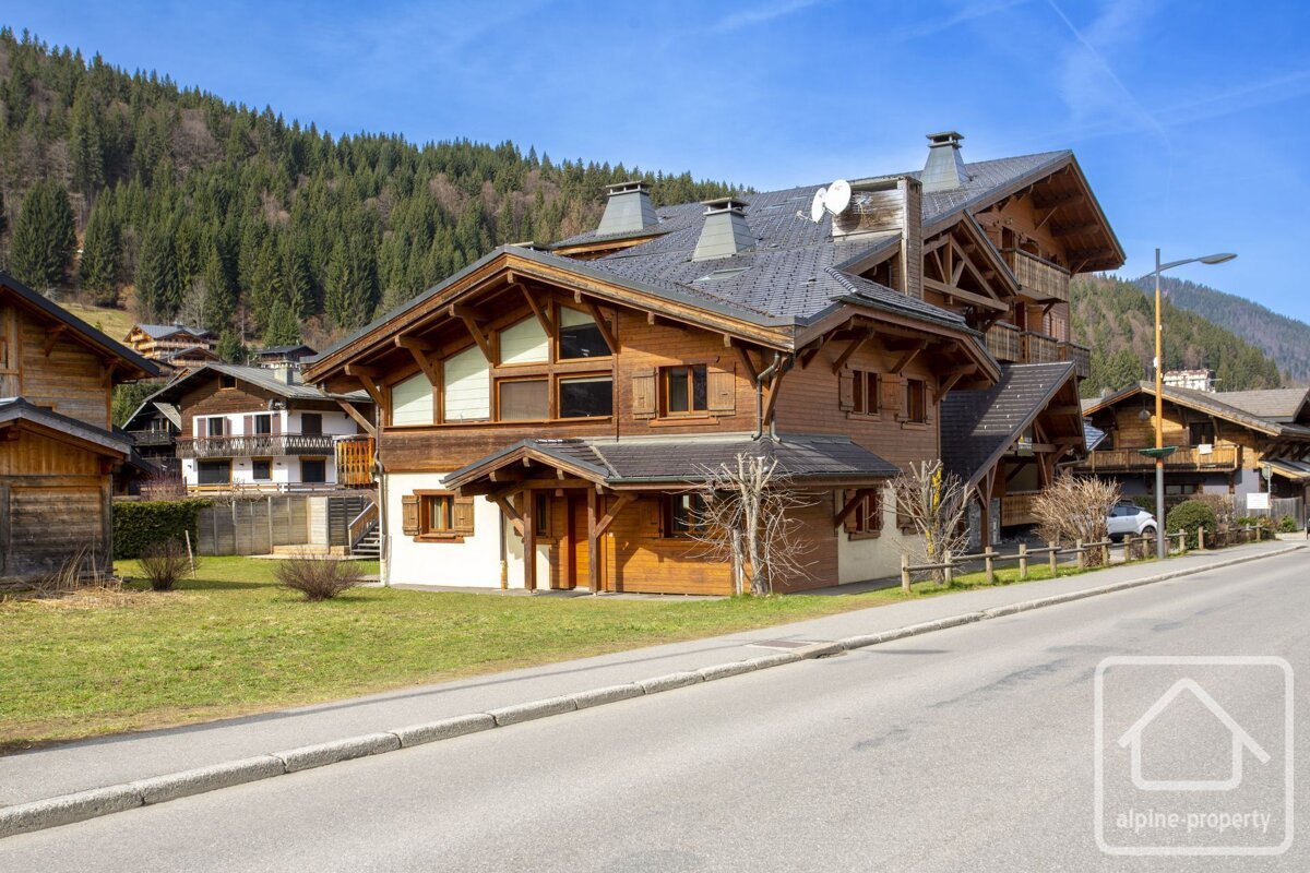 A house with the word alpine property on it