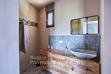 A bathroom with the words made in provence on the wall