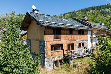A house with a satellite dish on the roof