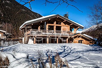 A picture of a snow covered cabin taken by ten80 holidays