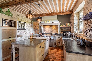 A kitchen with the word provence in the corner