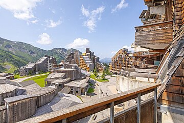 A view of a ski resort from a balcony