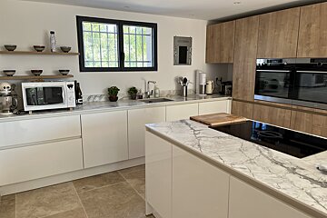 A kitchen with a bosch appliance on the wall