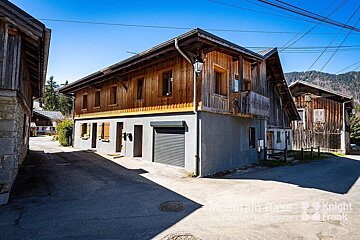 A house with a garage is for sale by knight frank