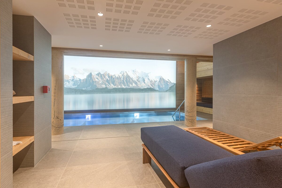 An artist 's impression of a swimming pool in a cabin