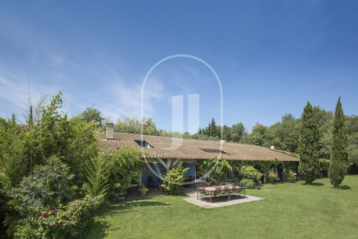 A house with the letter j on the front of it