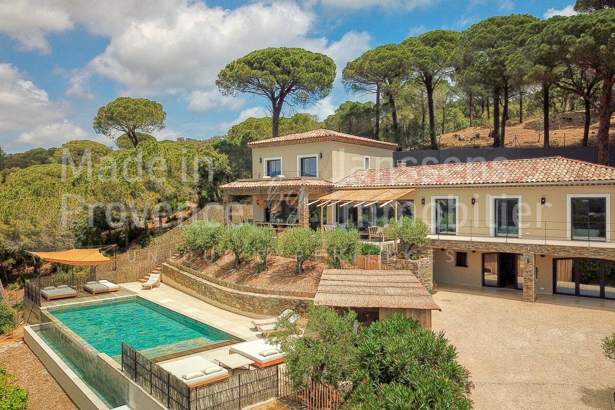 A large house with a large swimming pool is for sale in provence