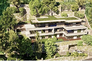 An aerial render of a modern three-story house with a green roof, set on a lush, terraced hillside with trees.