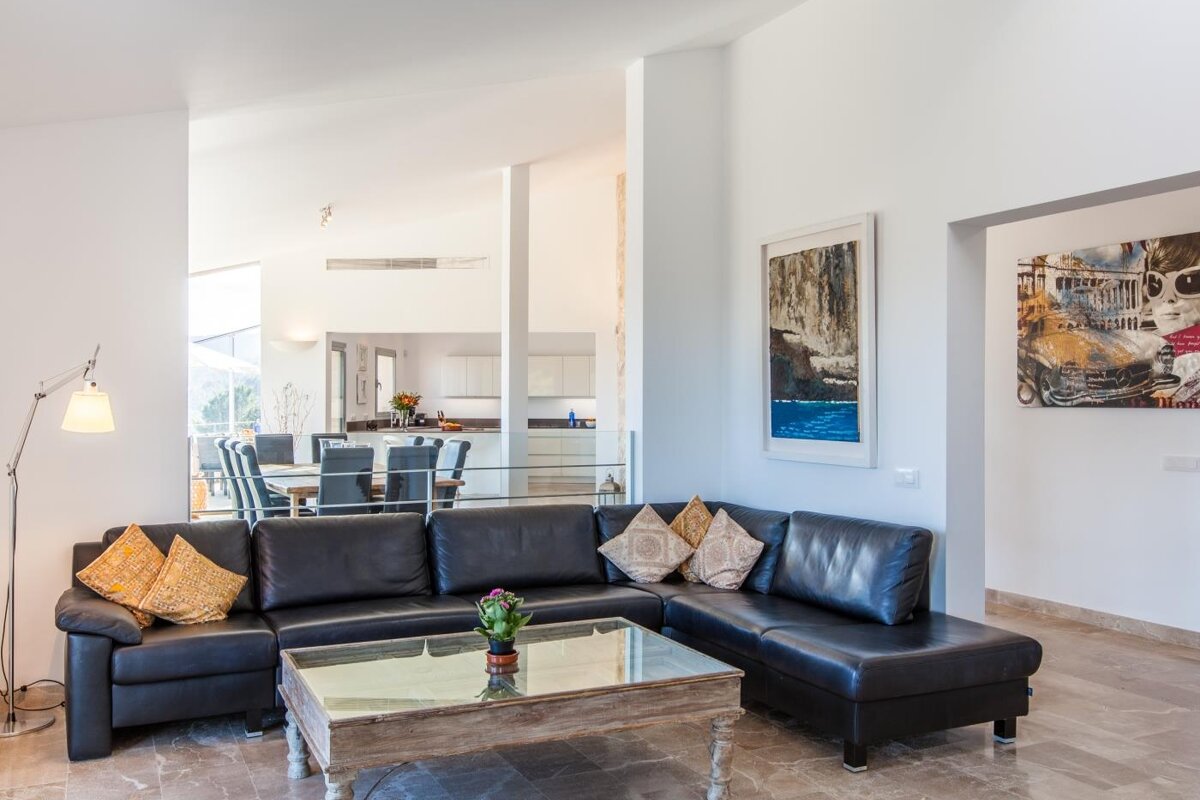 A living room with a couch and a coffee table