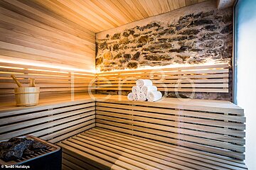 A photo of a wooden sauna taken by ten80 holidays