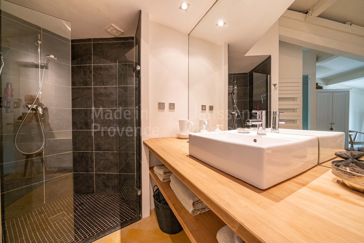 A bathroom with the words made in provence on the wall