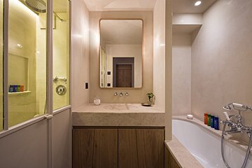 A bathroom with a sink and a bathtub