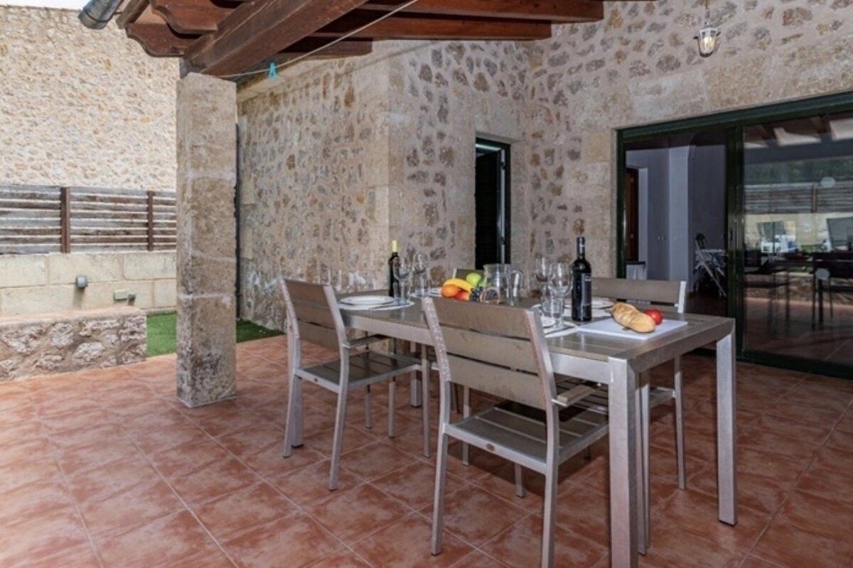 A table with a bottle of wine on it