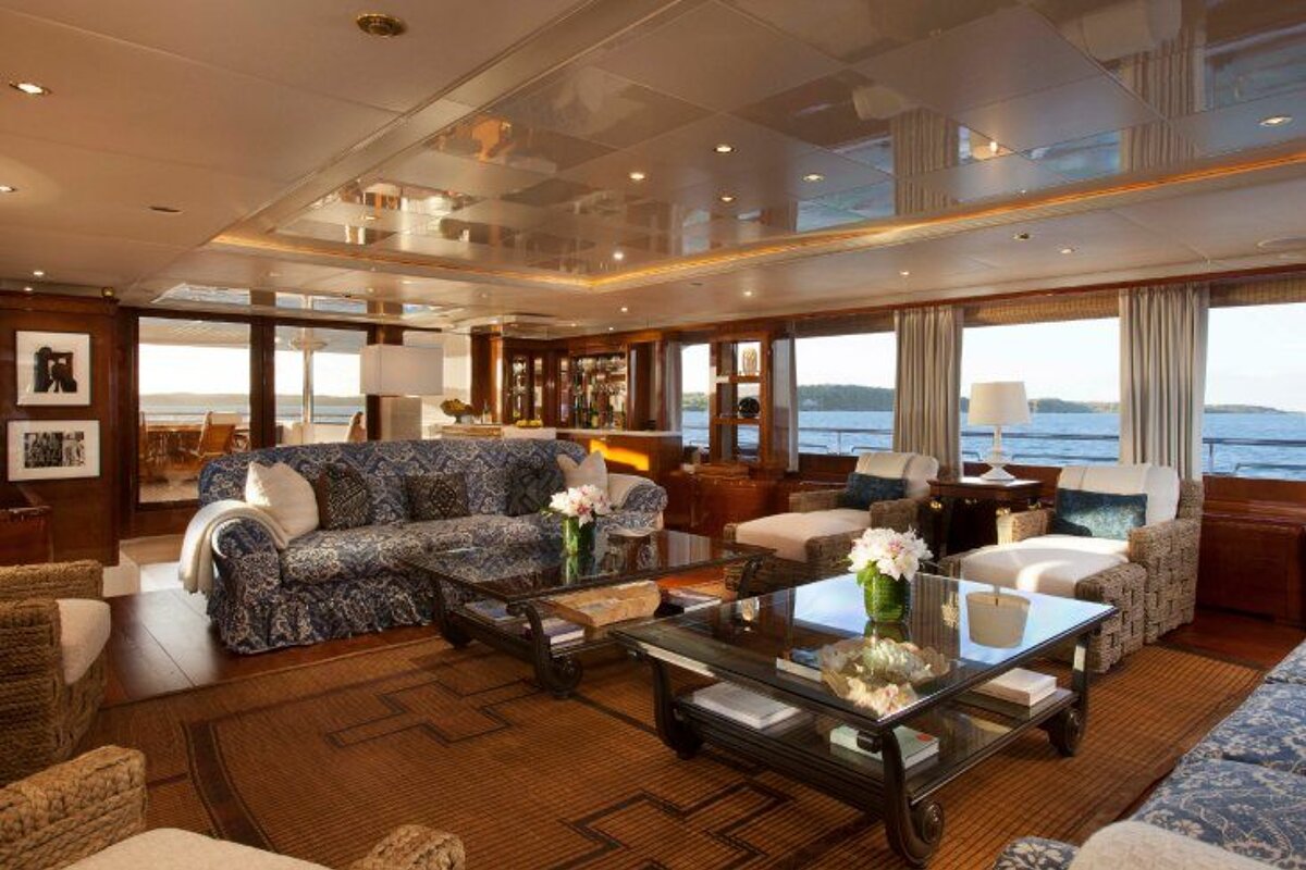 A living room with a couch and two coffee tables