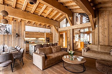 A living room with a couch and a coffee table