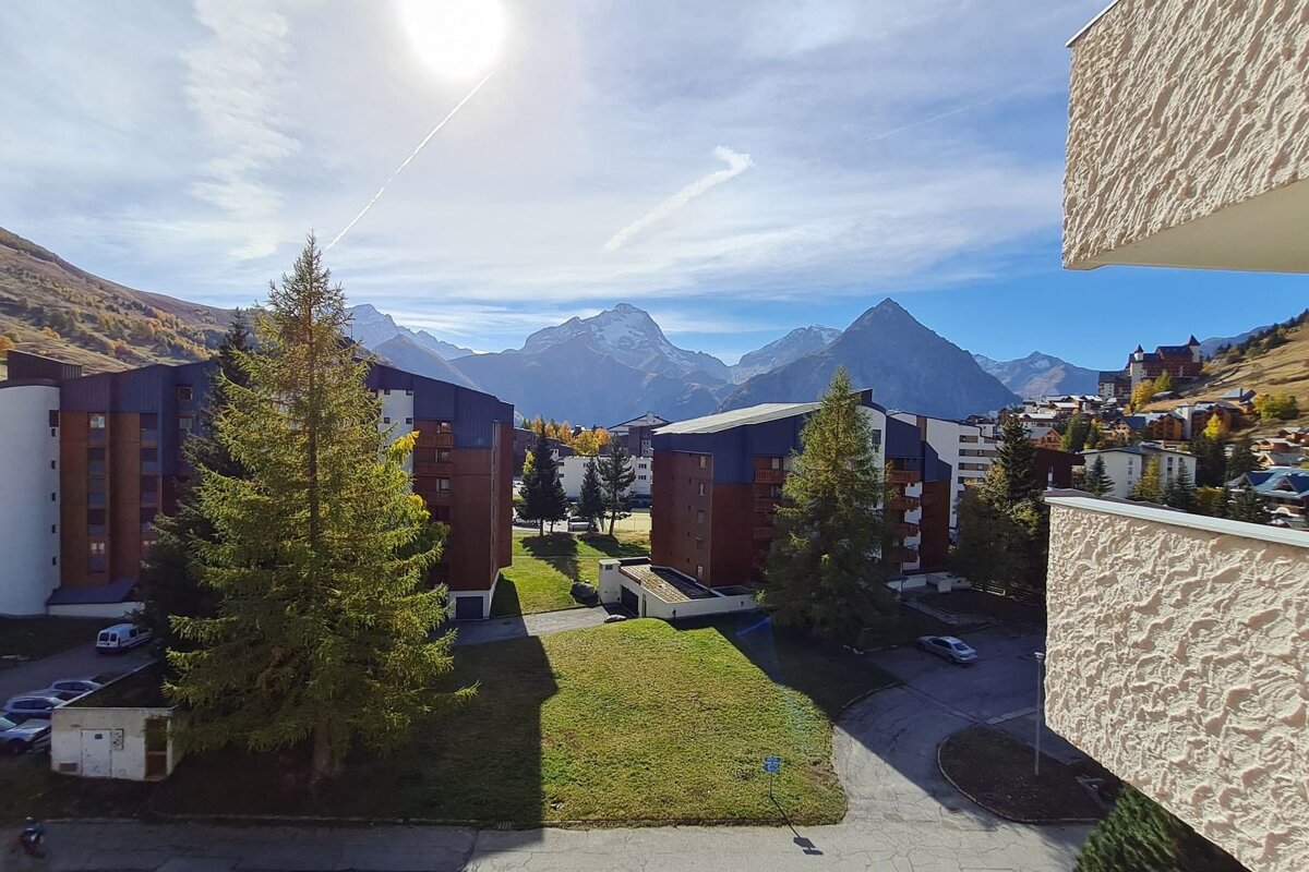 A view of a city with mountains in the background