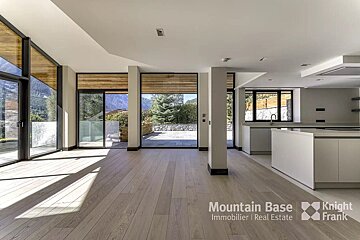 A room with a lot of windows and the words mountain base on the bottom