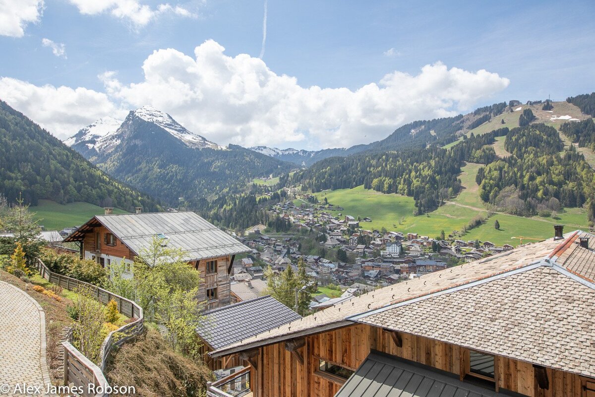 A photo of a mountain valley taken by alex james robson