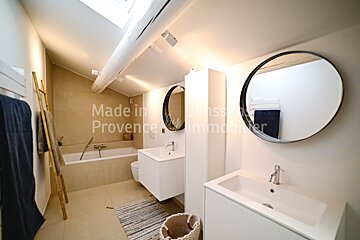 A bathroom with the words made in provence on the wall