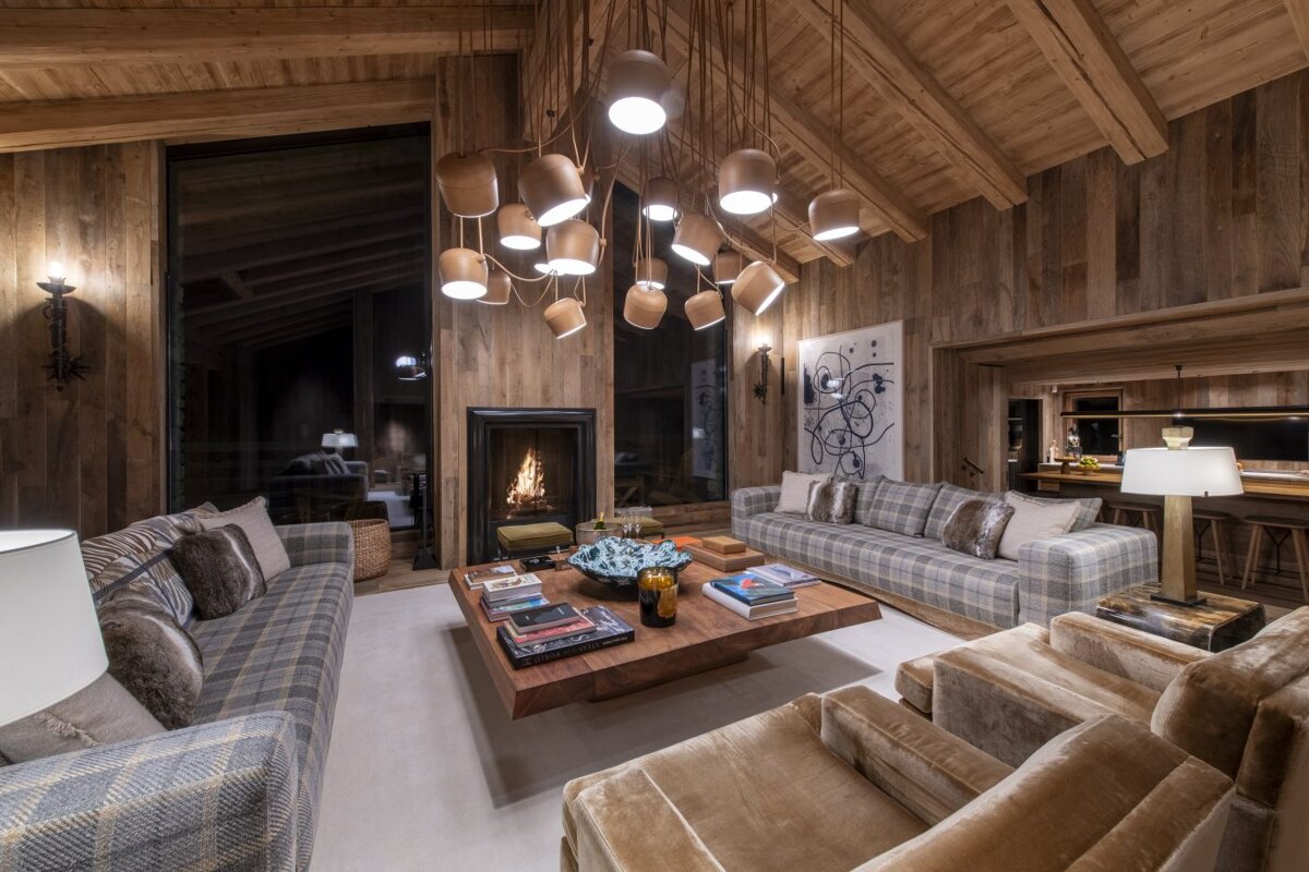 A living room filled with furniture and a fireplace