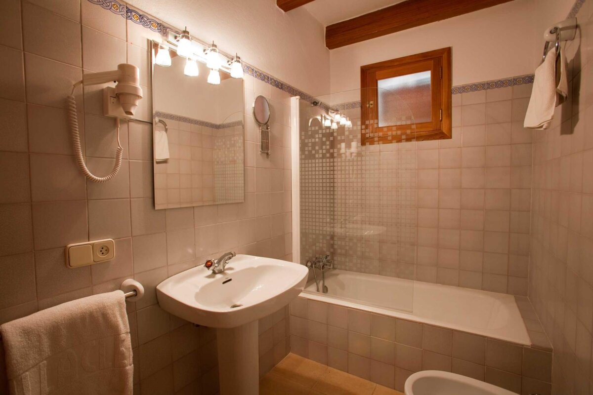 A bathroom with a sink and a bathtub