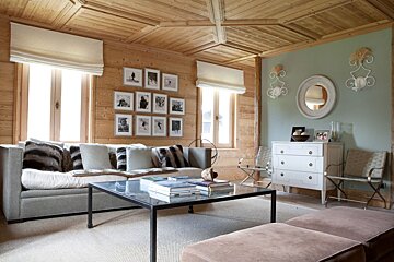 A living room with a couch and a coffee table