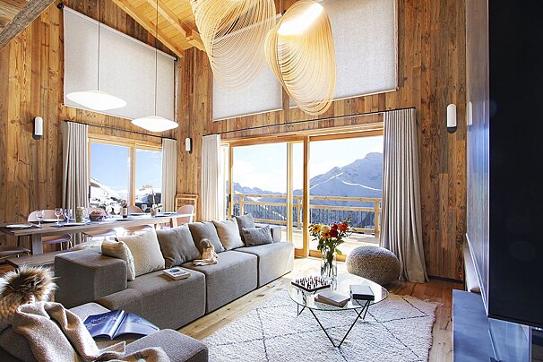 A living room with a couch and a coffee table