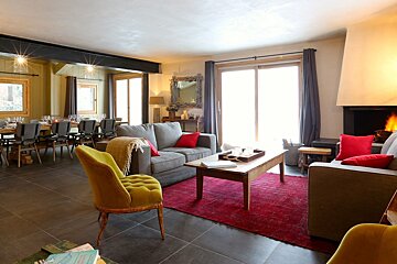 A living room filled with furniture and a fireplace