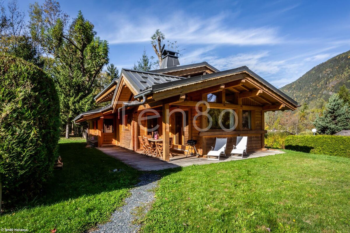 A small wooden house with the number 80 on it