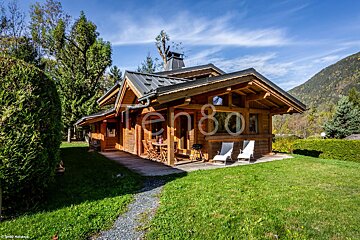 A small wooden house with the number 80 on it