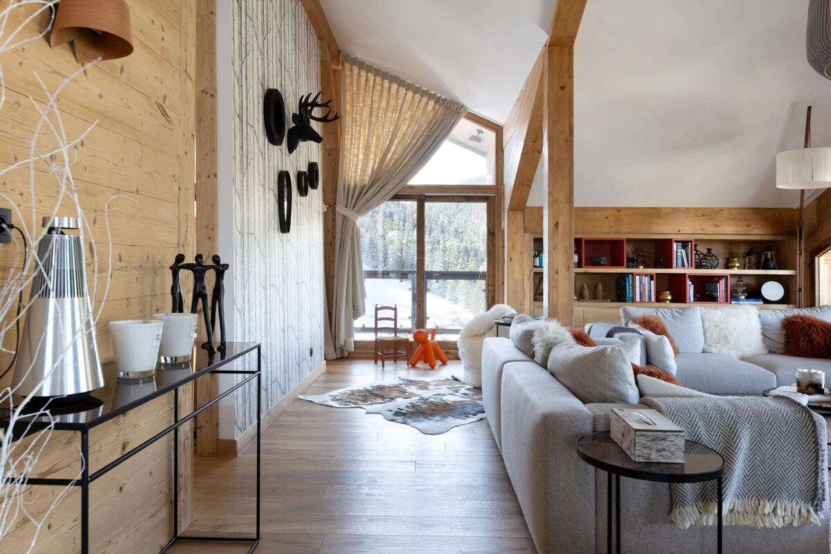 A living room with a couch and a table