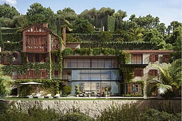 An opulent, vine-covered house nestled into a lush, green hillside, blending traditional timber-frame and stone with modern glass architecture.