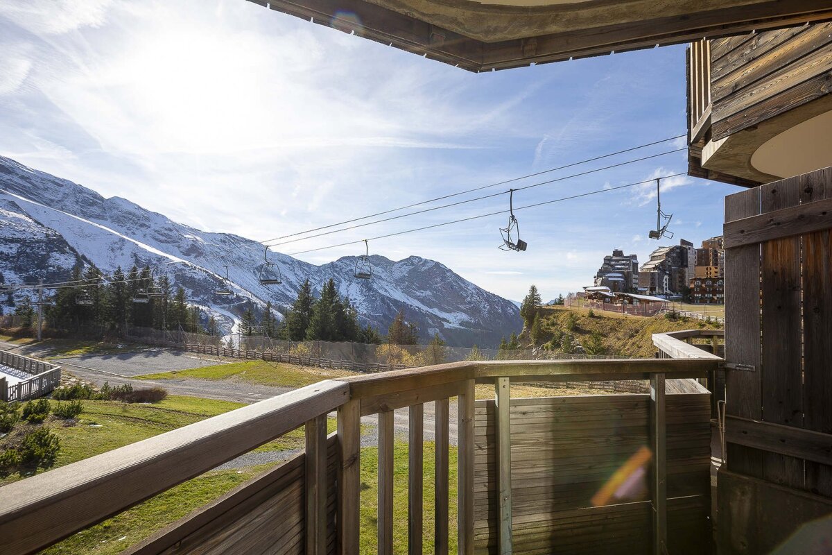 A view of a ski lift from a balcony