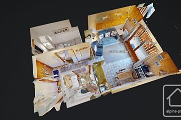 An aerial view of a house with the words chambre and balcony