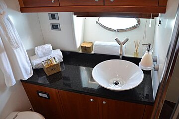 A bathroom with a sink and a toilet