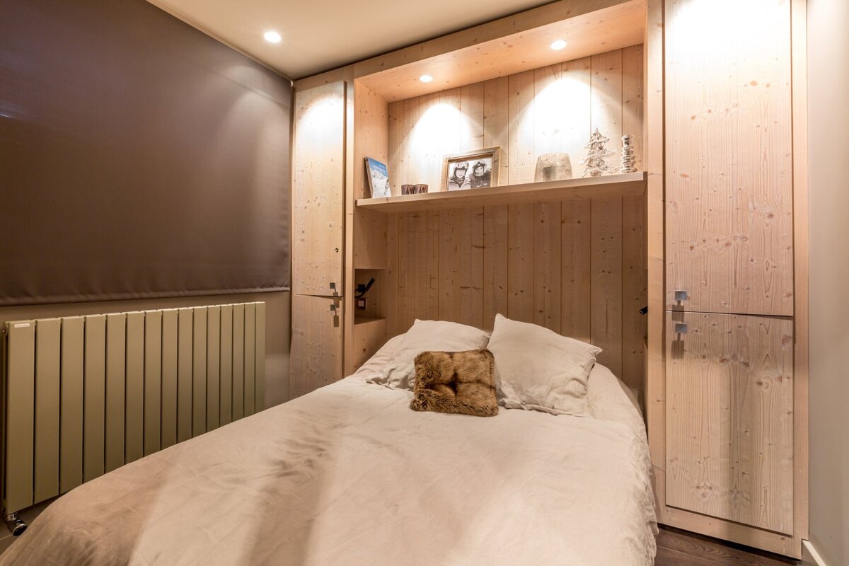 A bathroom with a green sink and a bathtub