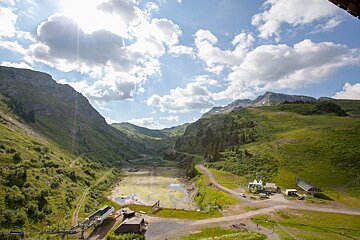A view of a snowy mountain from a balcony